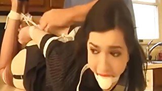 busty brunette hogtied with big ballgag