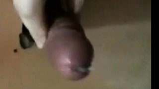 strange woman sucks off dick through a toilet partition wall