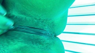 Hairy tight pussy masturbation in public tanning bed