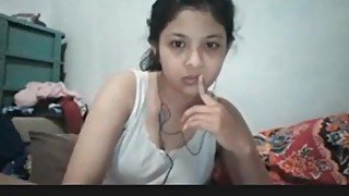 Latina teen enjoy playing in front of a cam