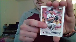 Opening a Pack of Baseball Cards