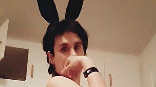 Sexy bunny boy slave with big dildos