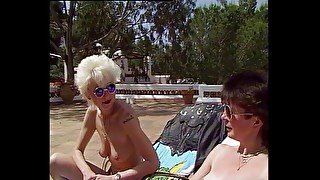 Horny bitches fuck each other after getting their tan