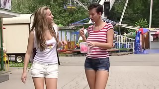 Lesbians play in the lake and eat pussy in the sand