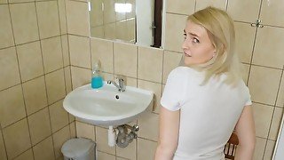 Cute blonde is fucked in the toilet next to a cuckold boyfriend