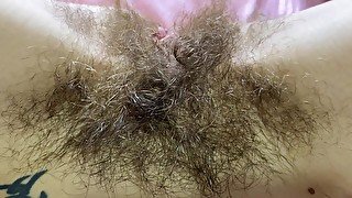 Hairy pussy big clit closeup