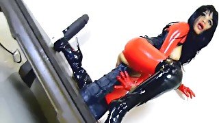 Nasty wife is wearing latex and fucking a humongous toy