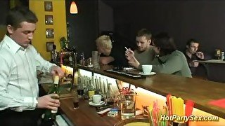 Blonde sucks boners in club