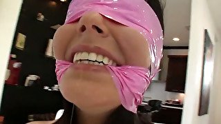 Hot chick is having her mouth fucked while she is being blindfolded