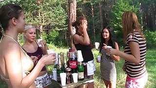 Topless college women erotically wash car at the picnic