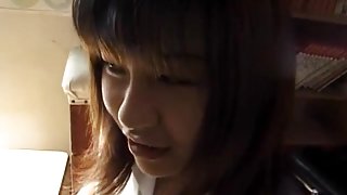 Eri Ueno in sexy uniform sucks cock over boxers until g