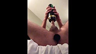 Hot guy strokes his big cock with spinning stroker with plug