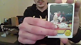 Cute Nerd Opening a Pack of Trading Cards