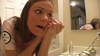 Cute teen does her makeup and talks dirty