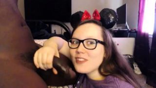 Nerdy brunette camgirl milks a big black cock with her mouth