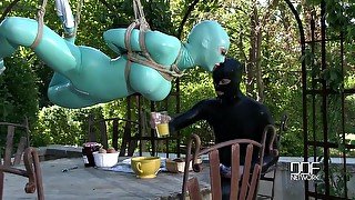 costumed Latex Lucy enjoys kinky sex games with a guy while she hangs