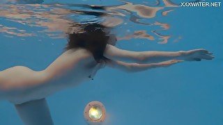 Petite Russian Marfa Swims Nude In The Pool