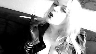 Sexy blonde slut smoking tease in leather