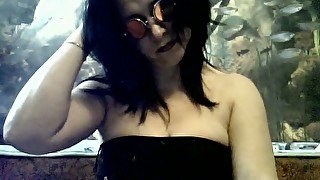 Those freaky sunglasses make her look like Marylin Manson