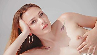 Solo erotic scene with the spellbinding redhead model Luna Lesun