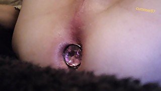 Anal training popping out butt plug