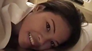 Cute Asian girlfriend gives her boyfriend sucking job