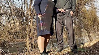 PAWG stepmom in pantyhose helps stepson pee on the lake