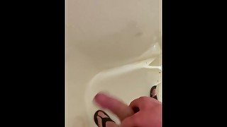 Tease playing with my chub in a public shower