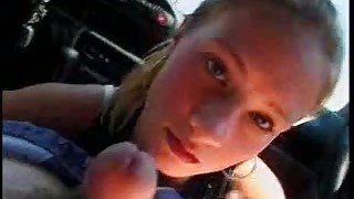 Alluring girl sucking hard pecker balls deep in car