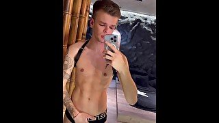 Horny tattooed twink Michael Moore playing and flexing his body