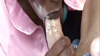 Slutty African Slave Gives Car Blowjob To Big Dong