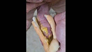 Guy shoves his cock between two saucy buns. ASMR. Hotdogs and mustard, not my proudest wank.