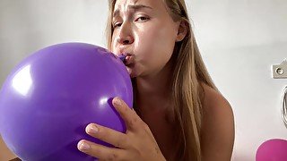 Beauty inflates huge balloons! Fetish