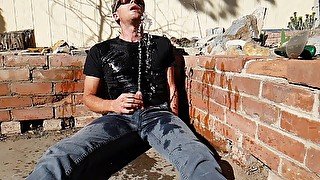 Outdoor golden shower and cumshot in slow motion