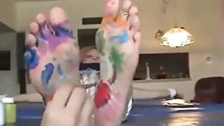 feet paint tickle