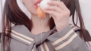 Crazy Japanese Student eats egg