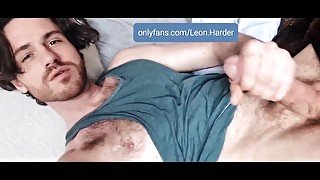 Hot handsome hairy guy jerks big hard dick