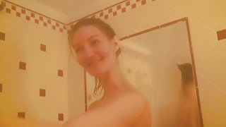 Vanessa Y. plays with her boobs and cunt in the shower