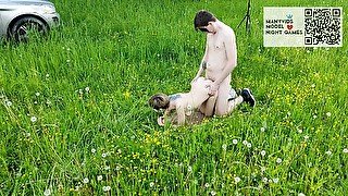 Passionate sex of a young couple in the field