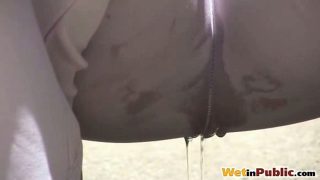 Chick lets hot pee trickle through pants