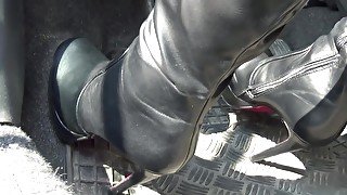 Smoking Hot Girl In Provocative Black Boots Does Some Pedal Pumping In The Sport Car