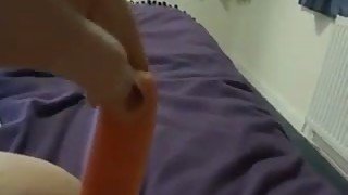 I fuck my shaved pussy with carrot spreading legs wide