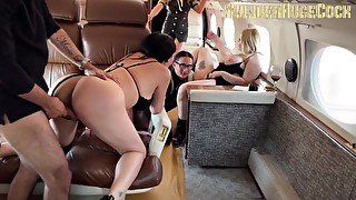 Together with my wife we have a spectacular orgy in my private plane with the stewardesses and the p