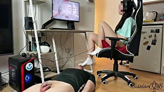 Mistress in white socks playing PC games . Locked in chastity boyfriend worshipping socks and feet