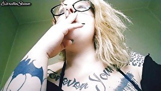 Blonde smokes a cigarette NO AUDIO