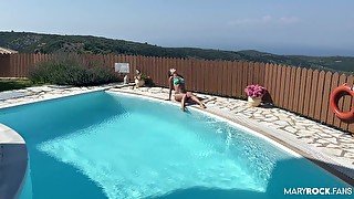 Beautiful bitch masturbates by the pool