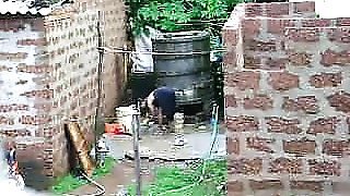 Watch this two hot Sri Lankan lady getting bath in outdoor