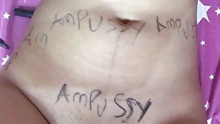 Asian teen girl writes "ampussy" on her naked body