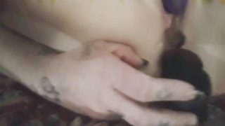 Sexy tattooed milf gets down and dirty with her toys...