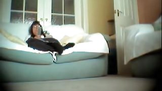 Young cutie watching tv and masturbating hot beaver